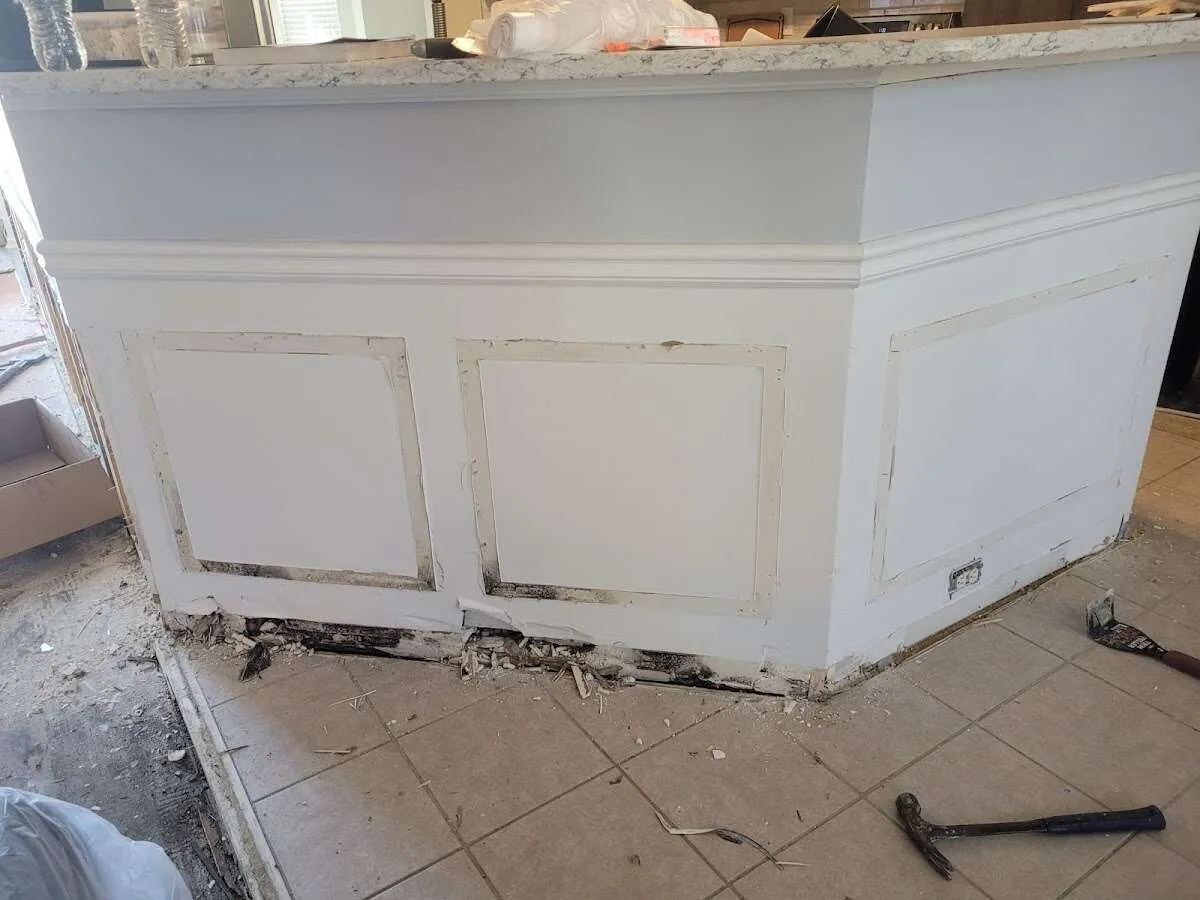 Water damage and mold on kitchen during Storm Damage Restoration in Red Bank